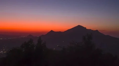 Sunset over a mountain peak Stock Footage 151426374