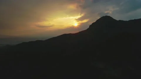 Sunset over a mountain peak. Stock Footage 151869984
