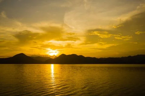Sunset over the mountain Stock Photos