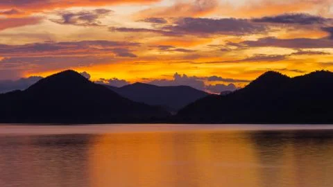 Sunset over the mountain Stock Photos