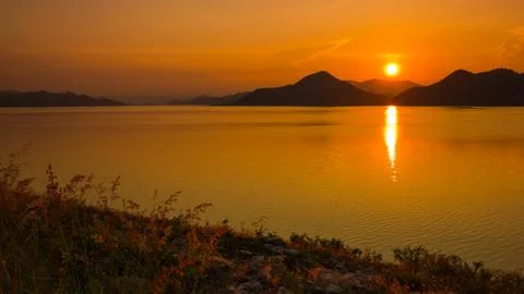 Sunset over the mountain Stock Photos