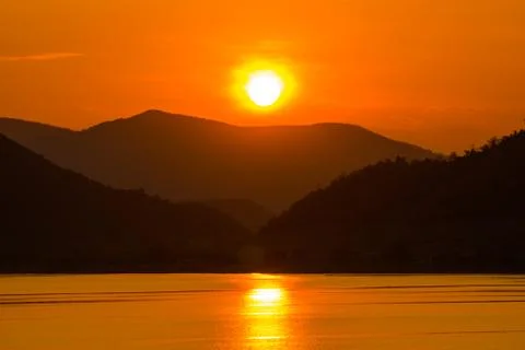 Sunset over the mountain Stock Photos