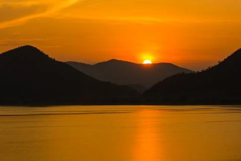 Sunset over the mountain Stock Photos