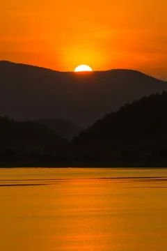 Sunset over the mountain Stock Photos
