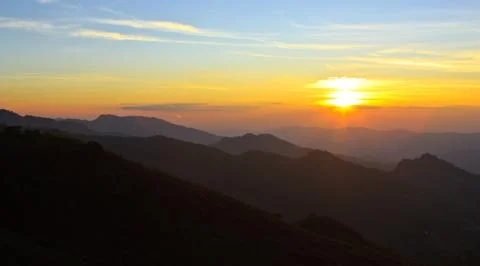 Sunset over mountain Stock Photos