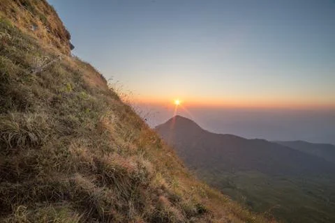 Sunset over mountain Stock Photos