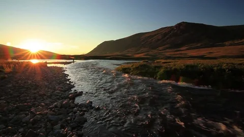 Sunset over mountain river in summer Stock Footage 72297898
