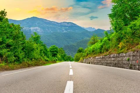 Sunset over mountain road Stock Photos