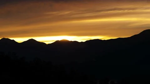 Sunset Over Mountain Silhouettes 動画素材 145894807