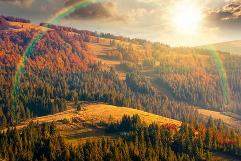 Sunset over mountainous rural landscape of ukraine in autumn Stock Photos