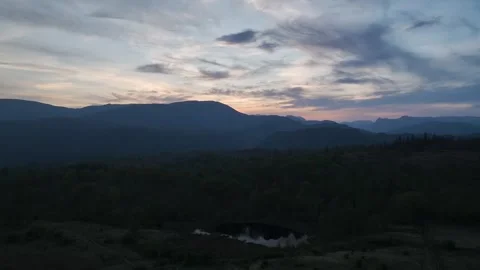 Sunset over Mountains and Coniston Water in Lake District National Park, Cumbria Stock-Footage 313933255