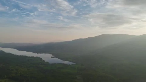 Sunset over Mountains and Coniston Water in Lake District National Park, Cumbria Stock-Footage 313933403