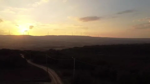 Sunset Over Mountains and Forest with a Road – Aerial 4K Drone View Stock Footage 320198455