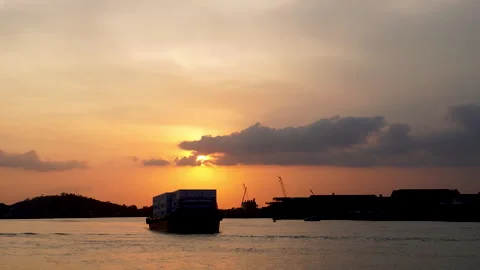 Sunset over Mountains and Reflective Waters 4K Timelapse Stock Footage 320826119