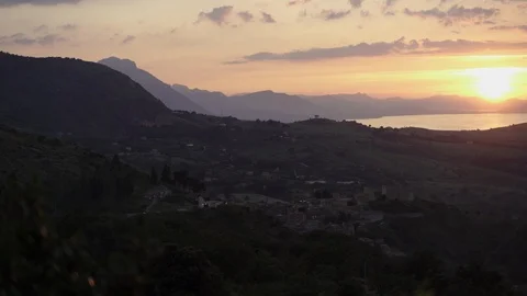 Sunset over mountains and sea coastline in Sicily Stock Footage 114535549