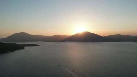 Sunset over mountains and sea 库存影片 237948290