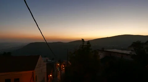 Sunset Over Mountains with Bokeh Focus Effect 動画素材 56503413