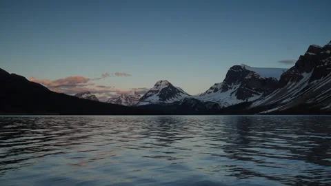 Sunset over mountains at Bow Lake, Banff National Park Stock Footage 135587085