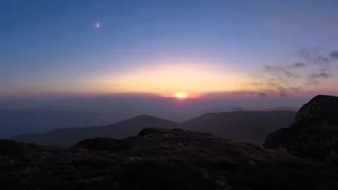 Sunset over the mountains Stock Footage 244417940