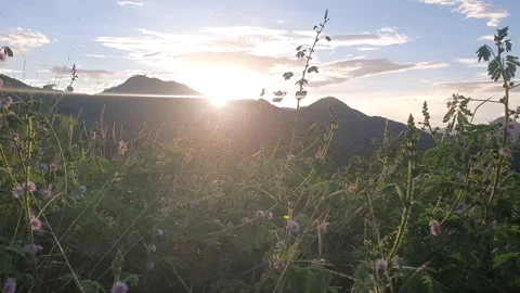 Sunset over the mountains in Indonesia 库存影片 334410747