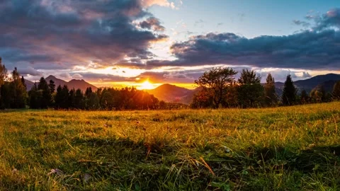 Sunset over mountains landscape in summer evening Europe nature Time lapse Stock Footage 293013909