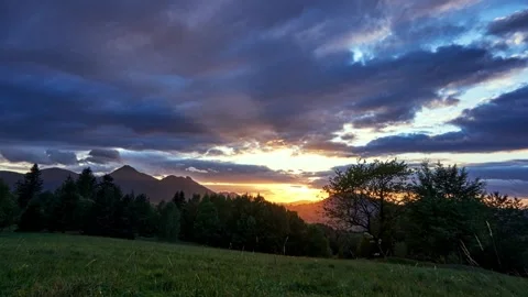 Sunset over mountains landscape in summer evening Europe nature Time lapse Vidéo 308481758
