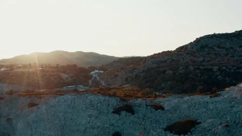 Sunset Over Mountains Ocean Bay Morning Sunrise Drone Aerial Soft Tilt Up Stock Footage 154521609