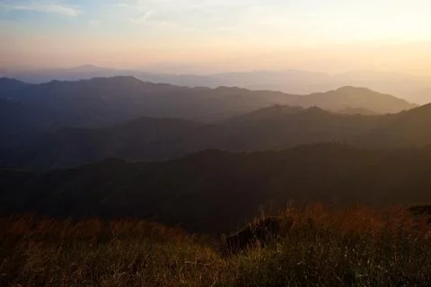 Sunset over mountains Stock Photos