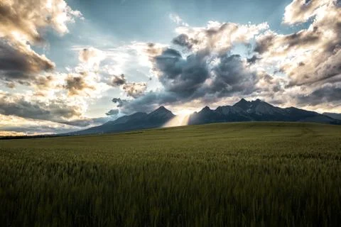 Sunset over the mountains Stock Photos
