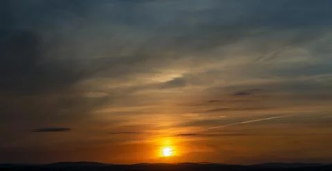 Sunset over mountains 写真素材
