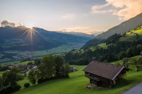 Sunset over the mountains Stock Photos