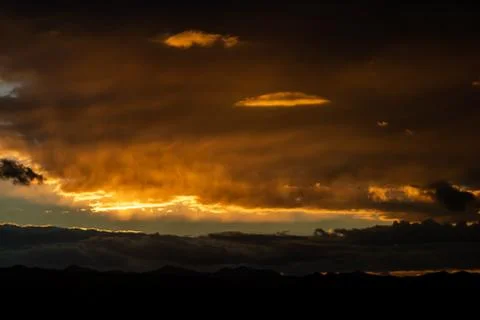 Sunset over mountains Stock Photos