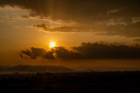 Sunset over mountains Stock Photos