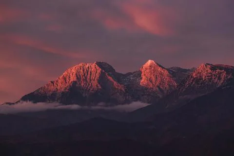 Sunset over the mountains Stock Photos