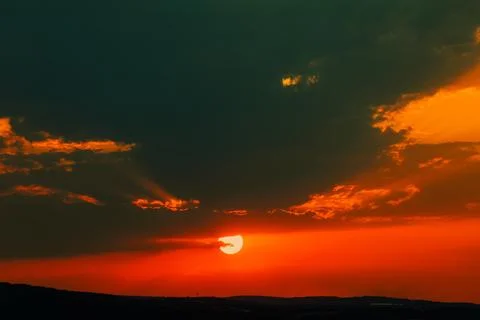 Sunset over the mountains Stock Photos