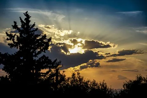 Sunset over the mountains Stock Photos