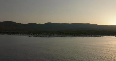 Sunset Over Mountains By The Sea Coast - Greece Aerial View 库存影片 250107932