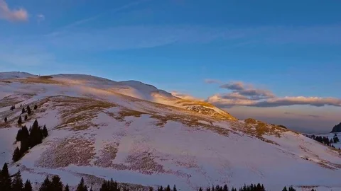 Sunset over mountains in spring Stock Footage 74169395