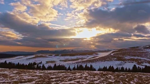 Sunset over mountains in spring Stock Footage 74169513