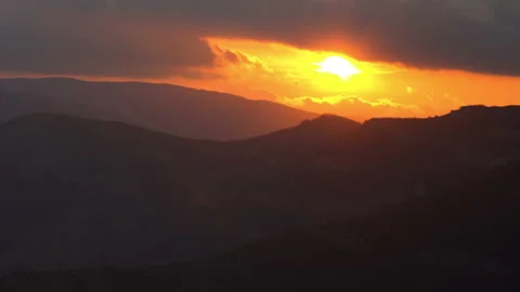 Sunset over the mountains. Timelapse Video stock 104468714