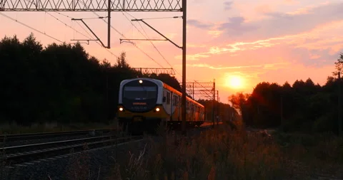 Sunset over a Moving Train Stock Footage 141156353