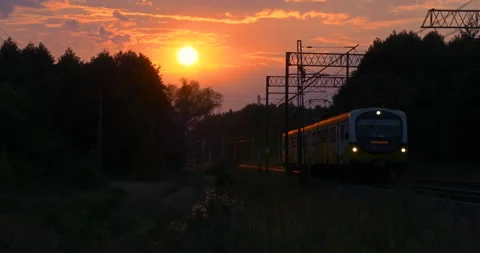 Sunset over a Moving Train Stock Footage 141157874