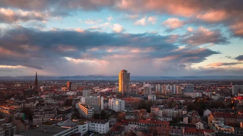 Sunset Over Mulhouse Cityscape with Dramatic Clouds Stock Footage 299754418