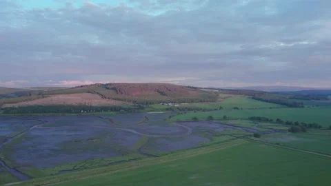 Sunset over Munlochy Bay from Munloch Bay, Highland, East Coast of Scotland, UK Stock Footage 197560185