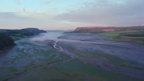 Sunset over Munlochy Bay from Munloch Bay, Highland, East Coast of Scotland Stock Footage 199029789