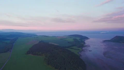 Sunset over Munlochy Bay from Munloch Bay, Highland, East Coast of Scotland Stock Footage 199035805