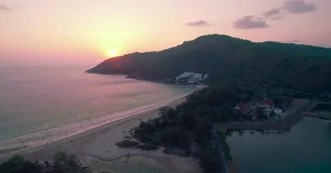 Sunset Over Nai Harn Beach in Phuket Thailand, Slider Style Aerial Shot Stock Footage 65987957