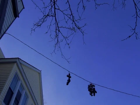 Sunset Over New Jersey Old School Shoes On Wire 스톡 동영상 73612583