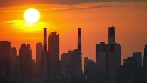 Sunset over NYC Con Ed Long Island City Stock Footage 321072866