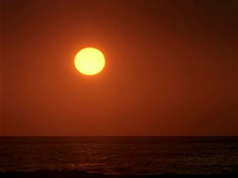 Sunset over Ocean 320x240 Stockbeeldmateriaal 558808